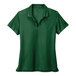 A green Nike polo shirt with a black swoosh and logo.