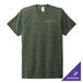 A large herb green AllMade tri-blend t-shirt with a logo on the counter.