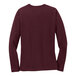 A Port & Company long sleeve maroon t-shirt for women.