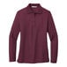 A Port Authority maroon long sleeve polo shirt.