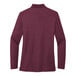 A Port Authority women's long sleeve silk touch pique polo shirt in burgundy.