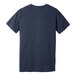 A heather midnight navy Bella + Canvas short sleeve t-shirt with a white logo on the back.