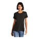 A woman wearing a black District short sleeve t-shirt.