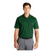 A man wearing a green Nike polo shirt with a collar.