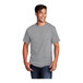A man smiling and wearing a Port & Company athletic heather short sleeve T-shirt.
