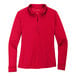 A red Port Authority women's long sleeve polo shirt.