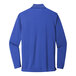 A blue long sleeve Port Authority polo shirt.