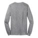 A long sleeved grey Port & Company shirt.