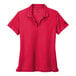 A red Nike Dri-Fit polo shirt with a black Nike swoosh.