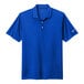A blue Nike polo shirt with a white Nike logo on the sleeve.
