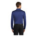 A man wearing a royal blue Port Authority long sleeve polo.