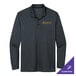 A Nike long sleeve black polo shirt with gold embroidery.