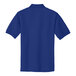 A blue Port Authority silk touch polo shirt.