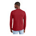 A man wearing a District red long sleeve t-shirt.