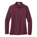 A maroon Port Authority long sleeve polo shirt.