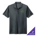A Nike anthracite polo shirt with a logo on it.