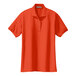 An extra small Port Authority orange polo shirt with buttons and a collar.