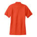 An extra small orange Port Authority polo shirt with a white collar.