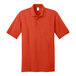 An orange Port & Company polo shirt with a collar and short sleeves.