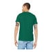 A man wearing a Bella + Canvas heather grass green t-shirt with tattoos on his arms.