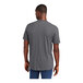 A man wearing a District Heathered Charcoal T-shirt.