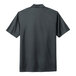 A black Nike men's polo shirt with short sleeves and a collar.