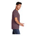A man wearing a Port & Company Heather Athletic Maroon T-shirt.