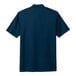 A navy Nike polo shirt with a collar and short sleeves.