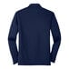 A navy Port Authority long sleeve polo shirt.