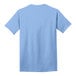 A light blue Port & Company T-shirt with short sleeves.