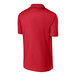 A red Sport-Tek polo shirt.