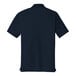 A back view of a navy Port Authority Dry Zone short sleeve polo shirt with a collar.