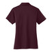 A close-up of a maroon Port Authority ladies' short sleeve polo shirt.