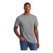 A man wearing a District® grey frost short sleeve t-shirt.