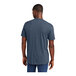 A man wearing a District heathered navy blue T-shirt.