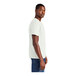 A person wearing a white District t-shirt.