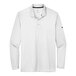 A white Nike short sleeve polo with black trim.