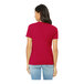 A woman wearing a Bella + Canvas heather red t-shirt.