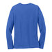 A back view of a Port & Company women's royal blue long-sleeve shirt.