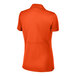 A Sport-Tek women's deep orange short sleeve polo shirt.