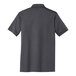 A back view of a Port & Company charcoal polo shirt.