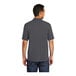 A man wearing a Port & Company charcoal short sleeve polo shirt.