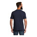 A man with a beard wearing a navy blue AllMade T-shirt.