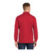 A man wearing a Sport-Tek unisex red long sleeve polo shirt.