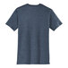 The back of a heathered navy District t-shirt with a white logo.