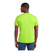 A man wearing a lime green District T-shirt.