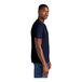 A person wearing a District New Navy short sleeve t-shirt.