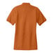 A Texas orange Port Authority polo shirt with a white collar.