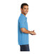 A man in a Port & Company aqua blue polo shirt.