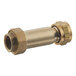 A close-up of a brass Watts 1" x 3/4" FMT x FNPT dual check valve union.